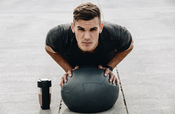 medicine ball pushups with a protein shake